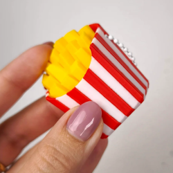 Pommes Frites Clicker � Fidget med Hul til N�glering